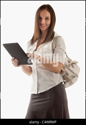 Young attractive businesswoman holding file Stock Photo