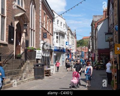 Baxtergate a pedestrianised Shopping street in Whitby Town Centre North Yorkshire England Stock Photo