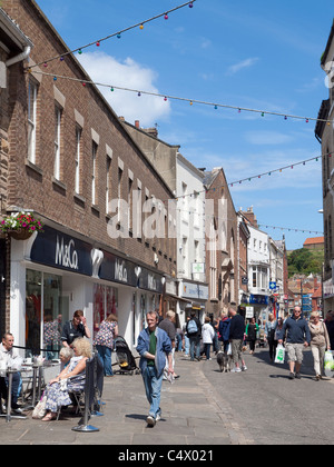 Baxtergate a pedestrianised Shopping street in Whitby Town Centre North Yorkshire England Stock Photo