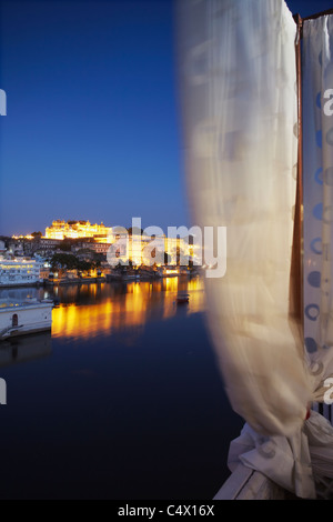 View of City Palace from rooftop restaurant at Lake Pichola Hotel, Udaipur, Rajasthan, India Stock Photo