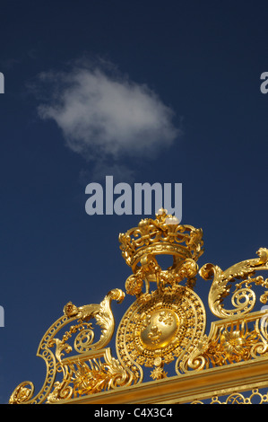 Detail of the golden gate at the Chateau of Versailles near Paris Stock Photo