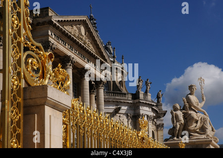 Ornate golden railings at the Chateau of Versailles near Paris Stock Photo