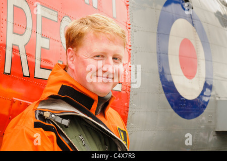 Commander Reese from the Royal Navy after his Sea King helicopter Rescue 177  lands at Armed Forces Day, Carrickfergus 25/06/2011 Stock Photo