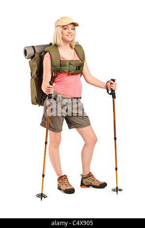 Portrait of a woman in sportswear with backpack and hiking poles Stock Photo