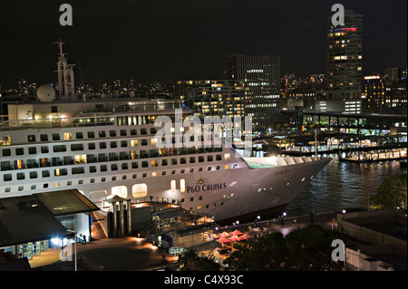 The P&O Cruise Ship Aurora Docked at Night in The Overseas Passenger Terminal in Sydney Harbour New South Wales NSW Australia Stock Photo