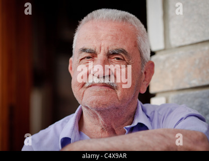 Portrait of elderly Greek man looking troubled, Tinos, Greece Stock Photo