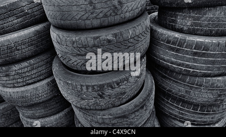 Stacks of old used recycled tires. Stock Photo