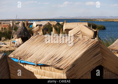 A hut made from torta or reeds on the floating islands of Uros on Lake Titicaca in the Peruvian Andes Stock Photo