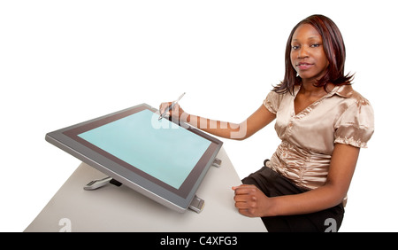 An African American Woman is working on a digital tablet. Stock Photo