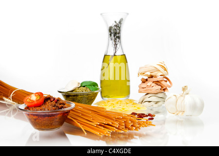 different kinds of pasta with pesto two different varieties Stock Photo