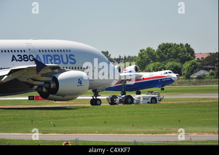 Airbus A380 at Le Bourget Airshow 2011 and Russian flying jet boat The Beriev Be-200 Altair Stock Photo