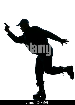 An afro American police man running with a handgun on white isolated background Stock Photo