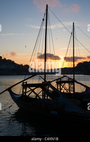 Porto, Two Port Wine Barges Moored at sunset. Stock Photo