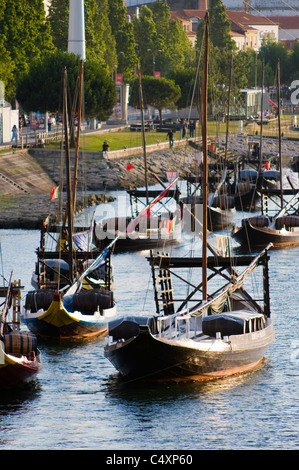 Porto, Port Wine Barges moored in late afternoon sunshine Stock Photo