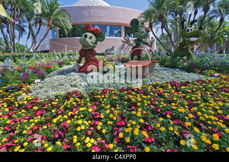 Epcot Center Orlando Florida topiaries of Mickey and Minnie Mouse and Pluto at the annual flower & garden festival Stock Photo