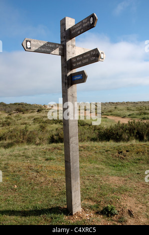 Signpost at the junction of the Peddars Way and Norfolk Coast Path National Trail, Holme-next-the-Sea, Norfolk, UK Stock Photo