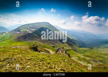 Landscape with Transalpina road and Urdele peak of Parang mountains in  Romania Stock Photo - Alamy