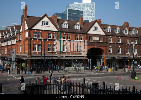 People Shopping outside in Old Spitalfields Market in Bishopsgate, London, England; UK Stock Photo