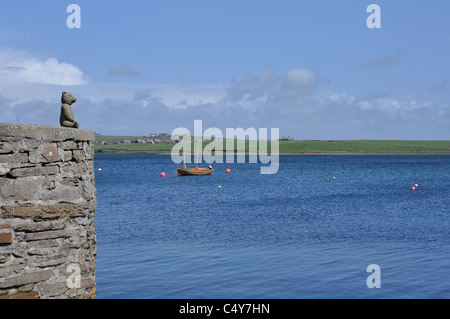 Stromness harbour and teddy bear on the wall, Orkney, Scotland. Stock Photo