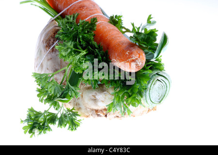 Vegetables, carrot, leek, celery, parsley, vegetables packed for preparing a stew, braising, making a sauce. Stock Photo