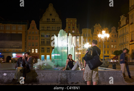 The fountain on the market square in Wroclaw in the evening, Poland Stock Photo