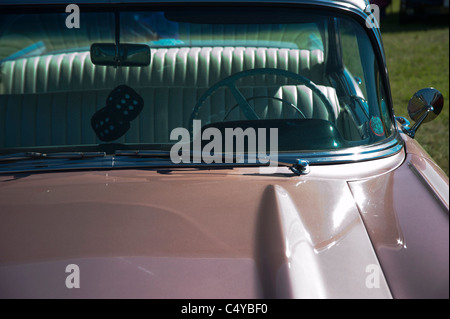 1950s Chevrolet, steering wheel, furry dice hanging from mirror Stock Photo