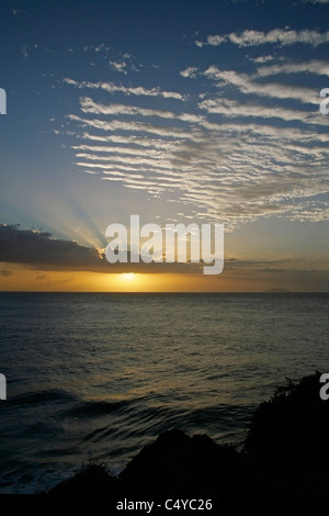 Sunset view from El Faro Park and the Punta Higuero Lighthouse in Rincon  Puerto Rico Stock Photo