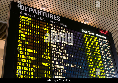 flight schedule monitor at airport Stock Photo