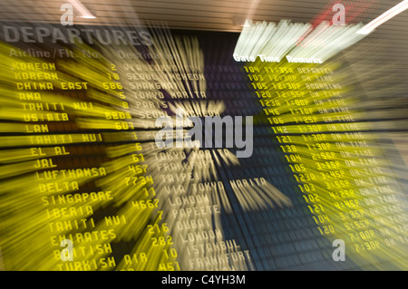 flight schedule monitor at airport Stock Photo