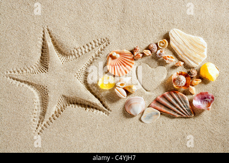 beach white sand heart shape and starfish printed and shells as summer vacation concept Stock Photo