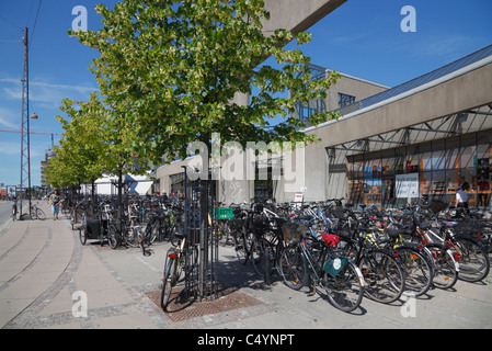 Bicycles in bicycle stands outside the city railway station Østerport (Oesterport) in Copenhagen, Denmark Stock Photo