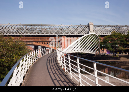 Castlefield Urban Heritage Park, Manchester, England, UK. Merchants Bridge footbridge across the Bridgewater Canal Stock Photo