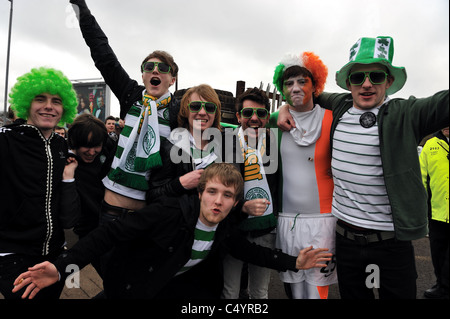 Celtic fans arrive at Hampden Park for the Scottish League Cup final against Rangers in 2011 Stock Photo