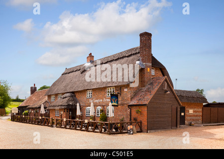 The Langton Arms thatched tavern village pub in Tarrant Monkton, Dorset, England, UK Stock Photo
