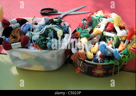 Sewing kit with scissors, yarn, pins and needles Stock Photo