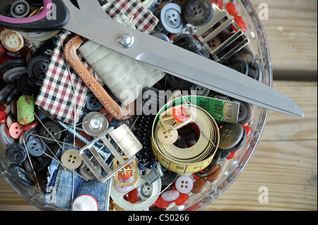 Sewing kit with scissors, yarn, pins and needles Stock Photo