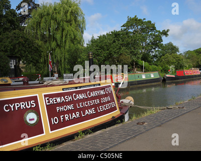 A narrow boat in the livery of the Erewash Canal Carrying Co Ltd. Grand Union Canal, Stoke Bruerne, Northamptonshire, England. Stock Photo