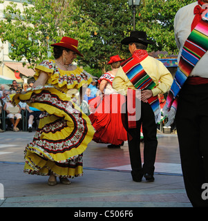 Cinco De Mayo dancers performing in the town square of The Villages in Florida USA dancing in the town square Stock Photo