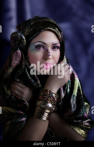 Closeup Portrait of a Beautiful Woman Wearing a Veil with Makeup Stock Photo
