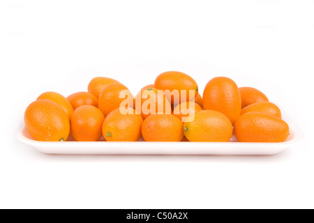 isolated kumquat, The fruit has a sweet outer skin and a tart inner flesh. Stock Photo