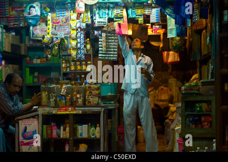 Shopkeeper in Gokarna, Karnataka province, India. Stock Photo