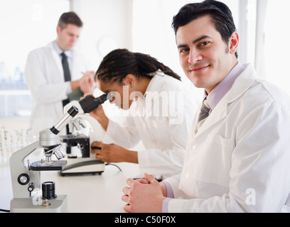 Scientists working in laboratory Stock Photo