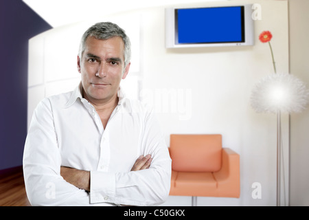 senior businessman posing in modern office interior Stock Photo