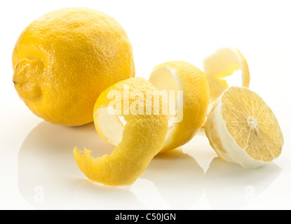 Twist of citrus peel on a white background. Stock Photo