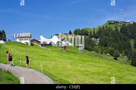 Railway station at Staffel on Rigi Mountain Switzerland with Rigi Event Tent and Rigi Kulm to the right Stock Photo