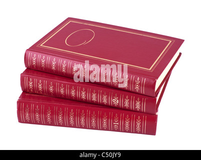 Horizontal pile of three red books Stock Photo