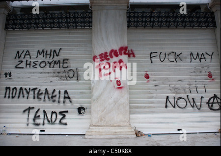 Graffiti on the facade of King George Hotel in Syntagma (Constitution) square in Athens Stock Photo