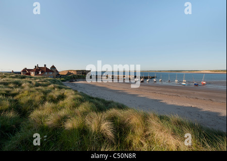 The beach and harbour at Beadnell. Stock Photo