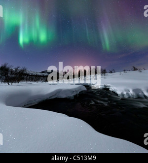 Aurora Borealis over Blafjellelva RIver in Troms County Stock Photo