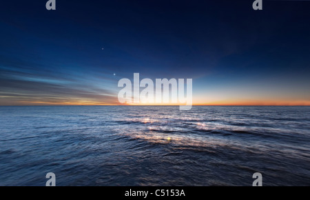 Venus and Jupiter in conjunction just a few minutes before sunrise over Rio de La Plata, Buenos Aires, Argentina. Stock Photo